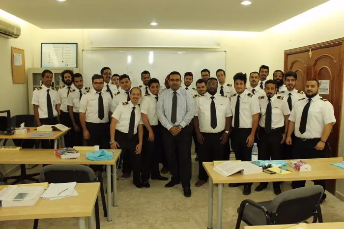 A class group photo after a briefing session