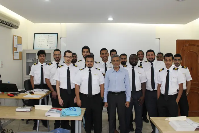 Students with their instructor at the end of a training session