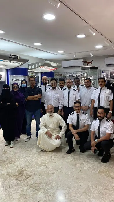 Visitors and trainees at the pilot shop