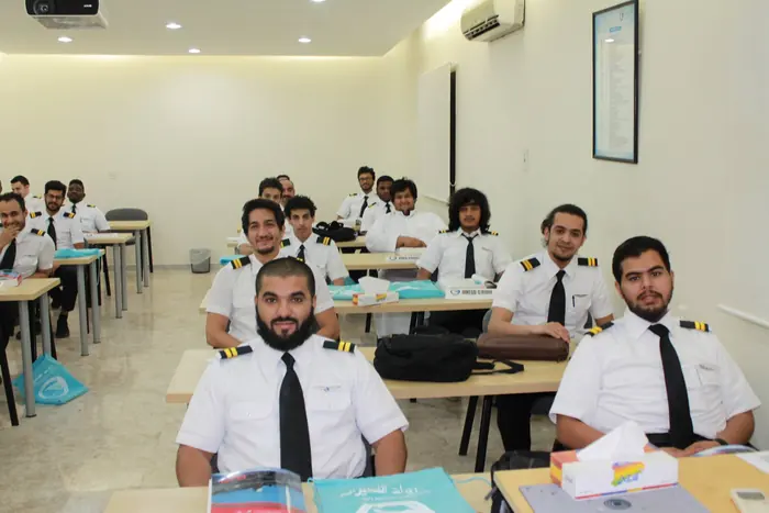 Trainees at their desks between sessions